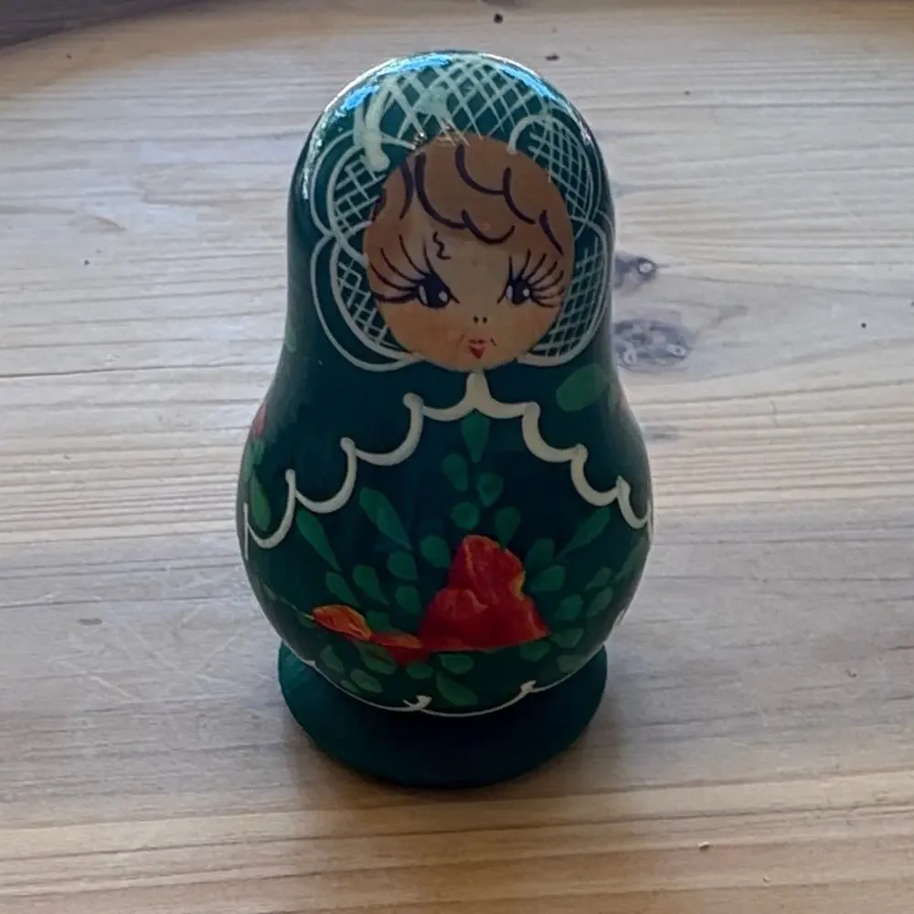 Vintage authentic Russian Green Matryoshka nesting Doll with Red Accents